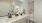 bathroom with two sinks and large mirror