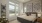 bedroom with large window and river view