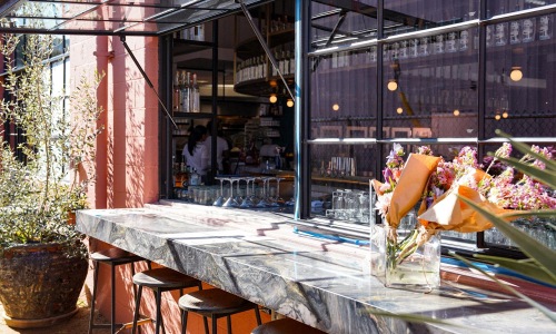 a restaurant with tables and chairs